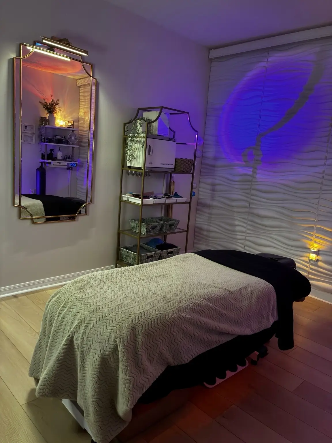 Massage table and calming interior at The Reset Room in Melbourne, Florida